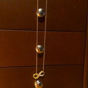 Gold infinity necklace